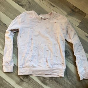 Distressed sweatshirt.